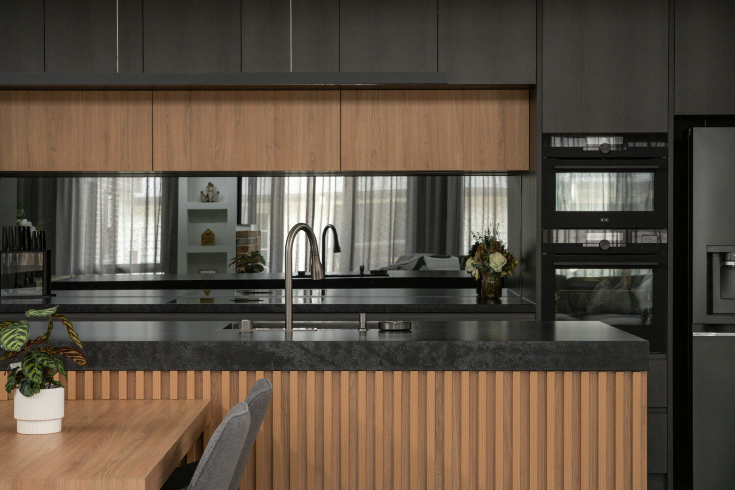 Modern timber and black kitchen